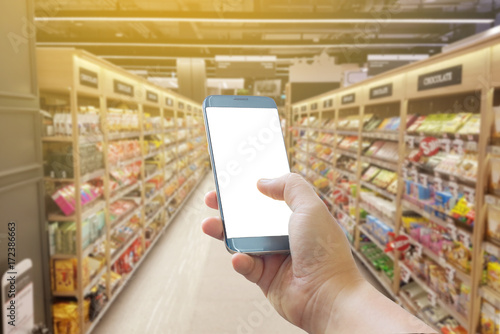 Layout with smart-phone holding in your hand, Screen blank for application, supermarket shoping 