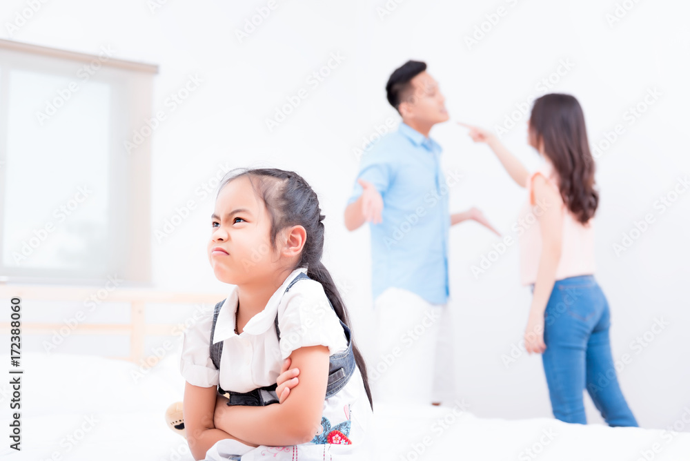 Frustrated of little girl is disaster in argument of mother and father in family conflict Frustrated of little girl is disaster in argument of mother and father in family conflict
