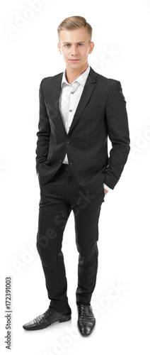 Young man in black suit on ...