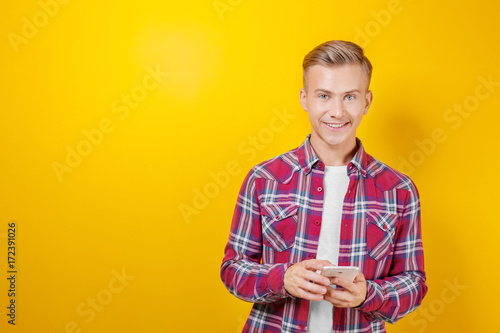 Handsome man with phone on ...