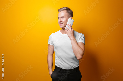 Handsome man with phone on ...
