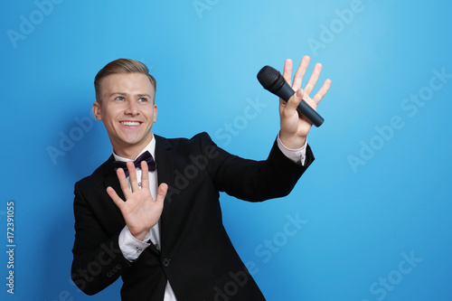 Young presenter with microp...