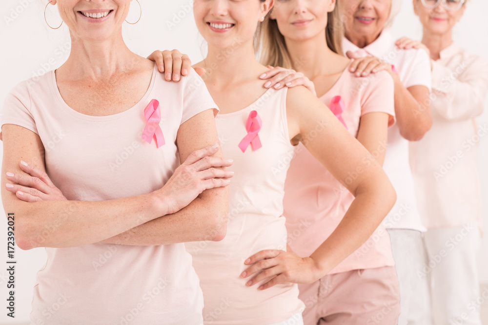 Female people with pink ribbons Female people with pink ribbons