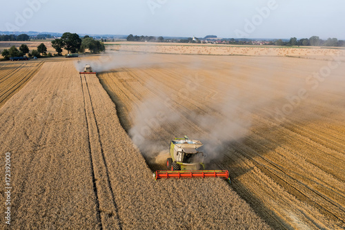 aerial view of the combine on harvest fields