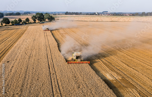 aerial view of the combine on harvest fields
