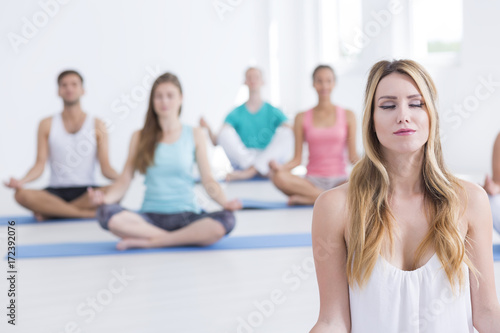 Young woman is meditating