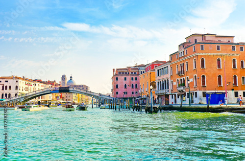 View of the Grand Canal and Venetian houses on a sunny day in Venice © Javen