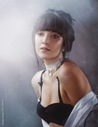 Sensuality. Beauty brunette, retro styled female portrait