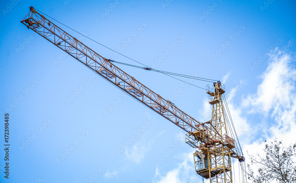 construction crane against the blue sky