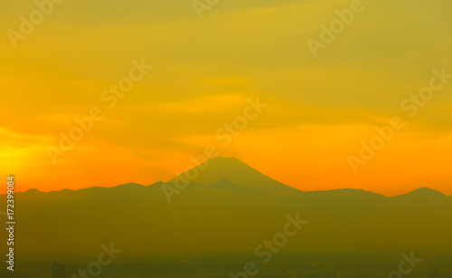 Mountain Fuji with sunset and the town in foregrund