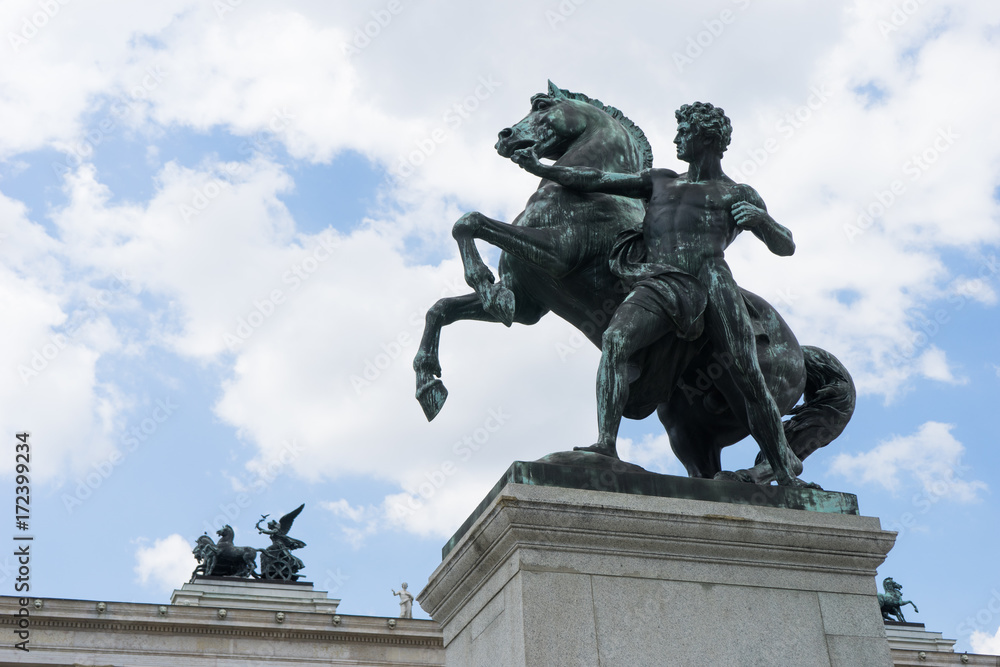 Bronze statue of the horse tamer in front of the Austrian Parliament Building, Vienna, Austria