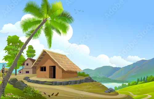 A small village next to a river and mountains