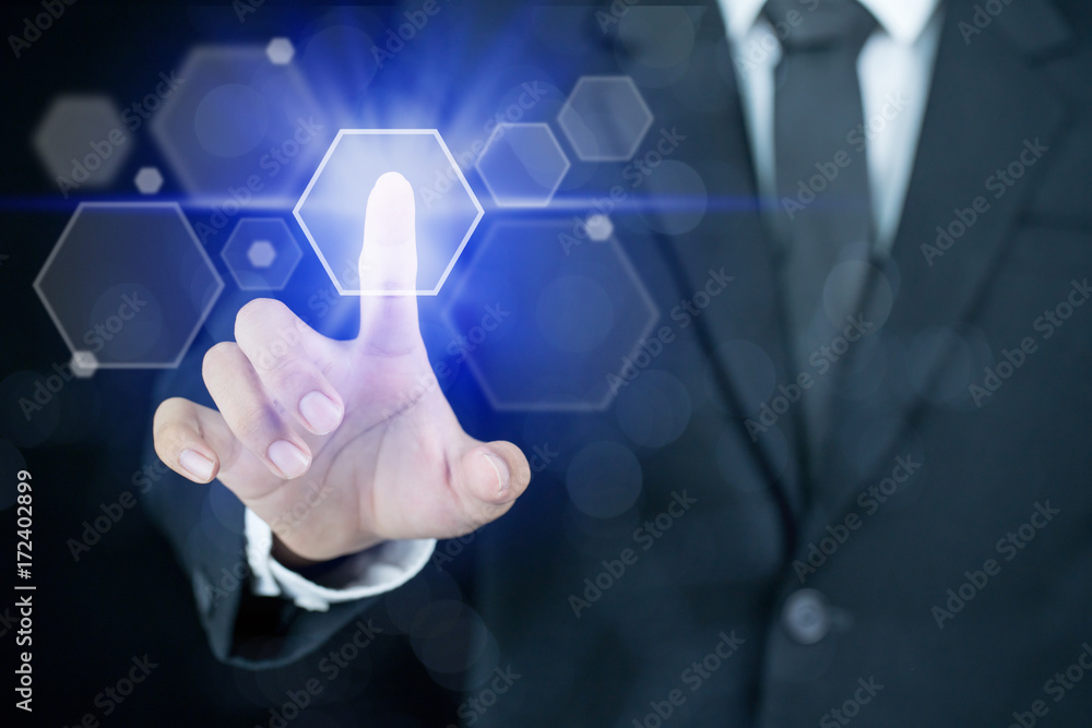 Businessman pointing his finger with hexagon icon Businessman pointing his finger with hexagon icon