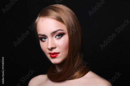 Beauty model on black background, fashion shooting
