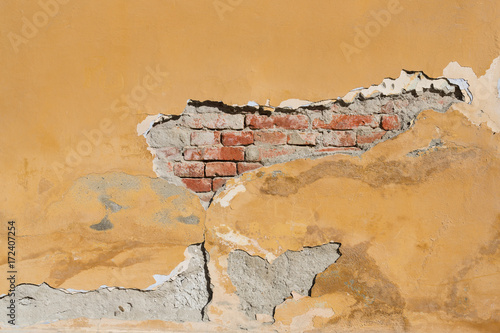 Brickwall With Broken Stucco Frame Texture. Old Brick Wall With Damaged Shabby Color Plaster Square. Distressed Stonewall Rectangular Wallpaper.