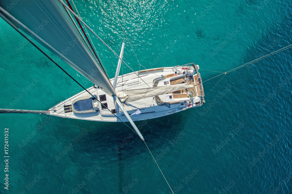 Fototapeta premium View from high angle of sailing boat. Aerial photography of ship deck