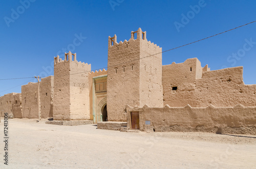 Beautiful old clay building called a kasbah in desert of Morocco, North Africa