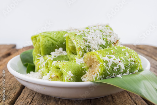 Malaysian traditional cake (Dadar gulung or Ketayap) made from flour, coconut steeped,palm sugar and pandanus flavors