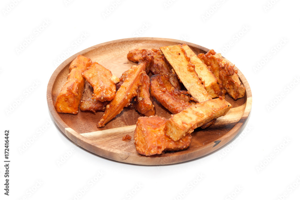 deep-fried sliced banana,taro,sweet potato on wooden plate deep-fried sliced banana,taro,sweet potato on wooden plate