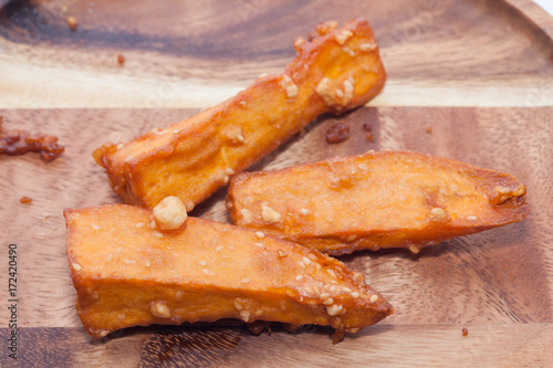 deep-fried sliced sweet potato on white background