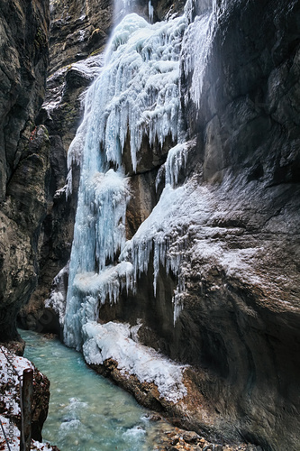 Frozen waterfall in Partnachklamm - Partnach Gorge in Garmisch-Partenkirchen, Bavaria, Germany.