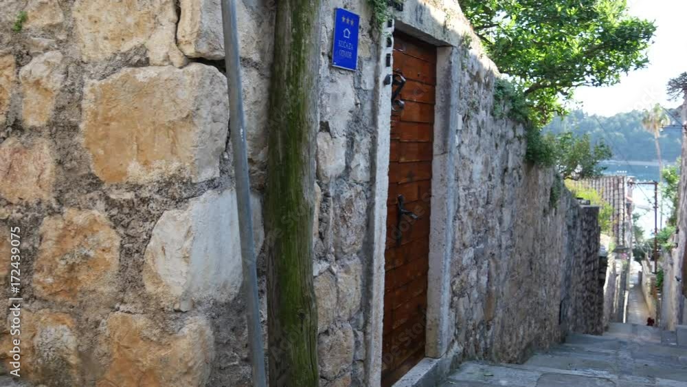Pan from the narrow streets of the old town from Cavtat Croatia Pan from the narrow streets of the old town from Cavtat Croatia