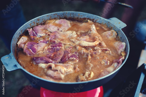 meat in a frying pan