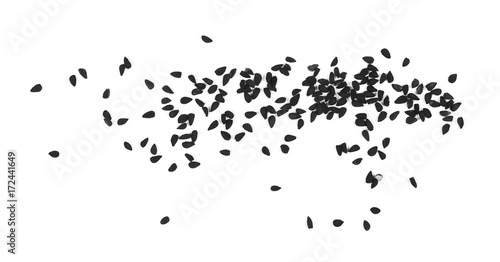 Pile of black cumin seeds isolated on white background, top view