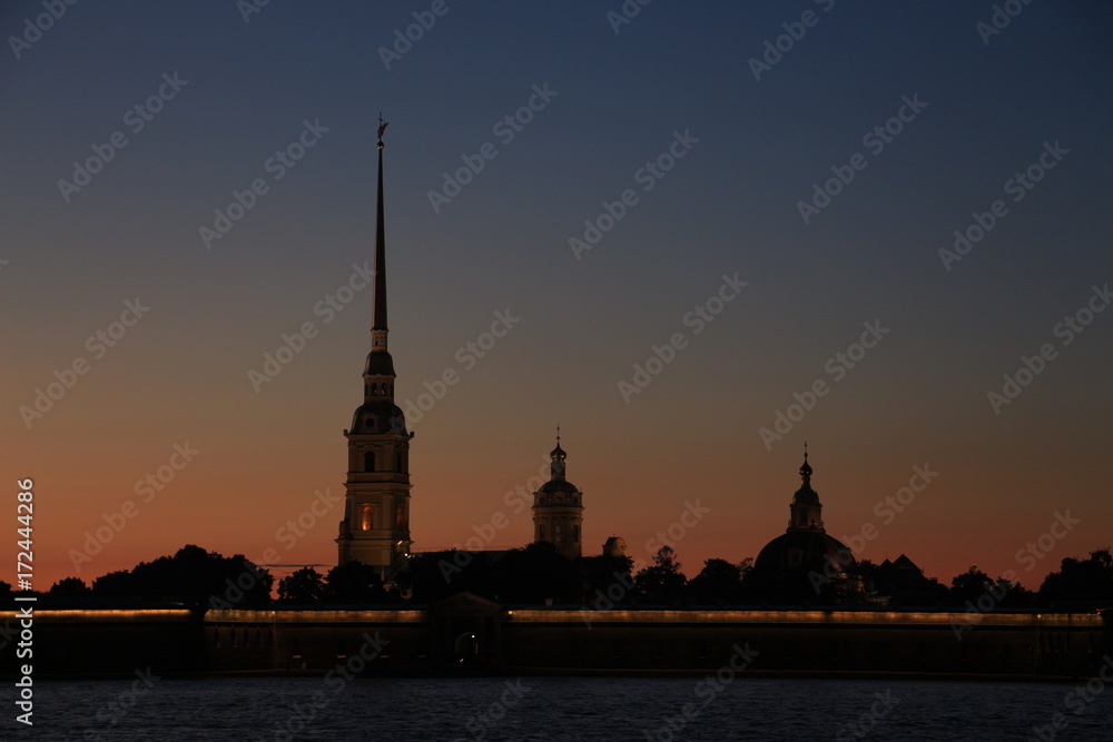Russia, St. Petersburg, the silhouette of the Peter and Paul Fortress at sunset