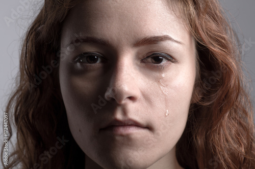 Portrait of a Redhead Crying Woman