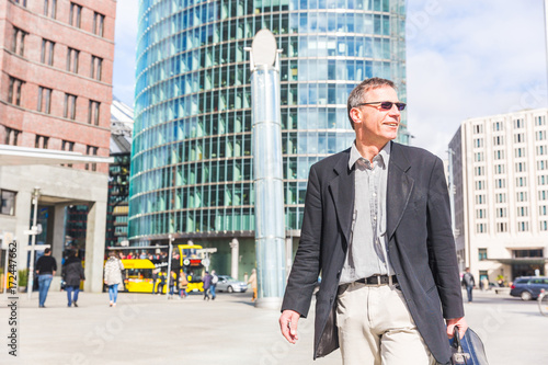 Photography Smiling senior businessman portrait in the city