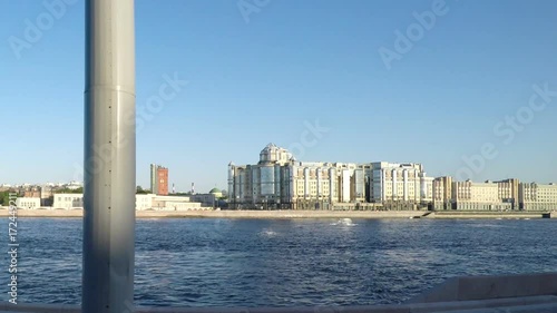 View through the Neva River from the moving car on Maloookhtinskaya Embankment in Krasnogvardeisky district of St. Petersburg. Russia photo