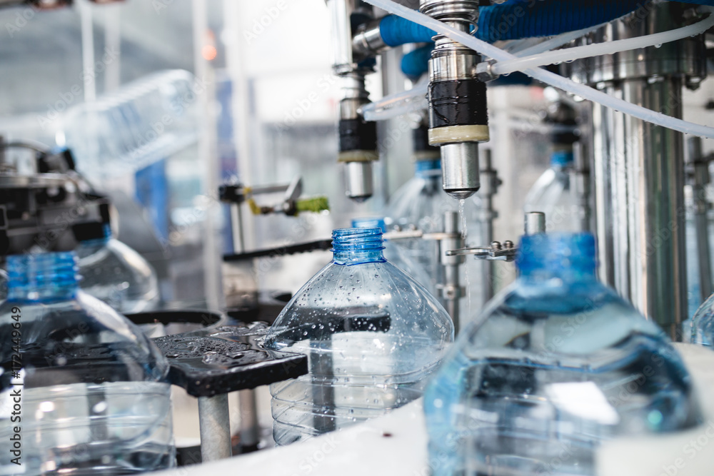 Bottling plant - Water bottling line for processing and bottling pure mineral carbonated water into bottles. Bottling plant - Water bottling line for processing and bottling pure mineral carbonated water into bottles.