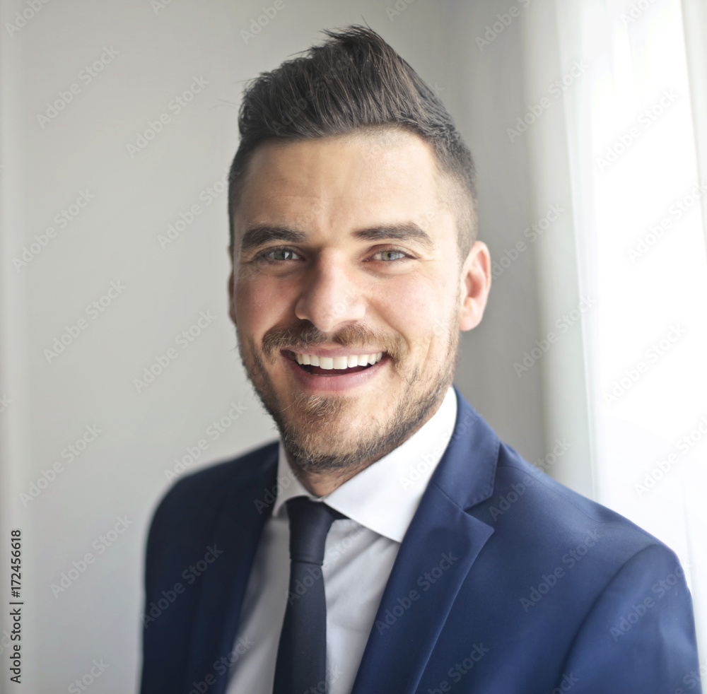 Smiling handsome employee Smiling handsome employee