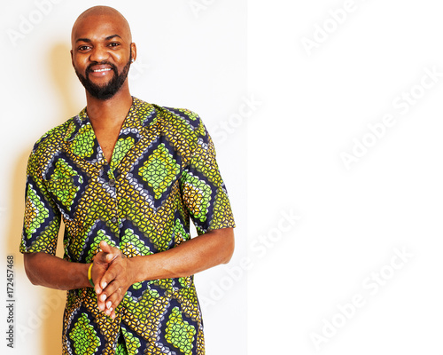 portrait of young handsome african man wearing bright green nati photo