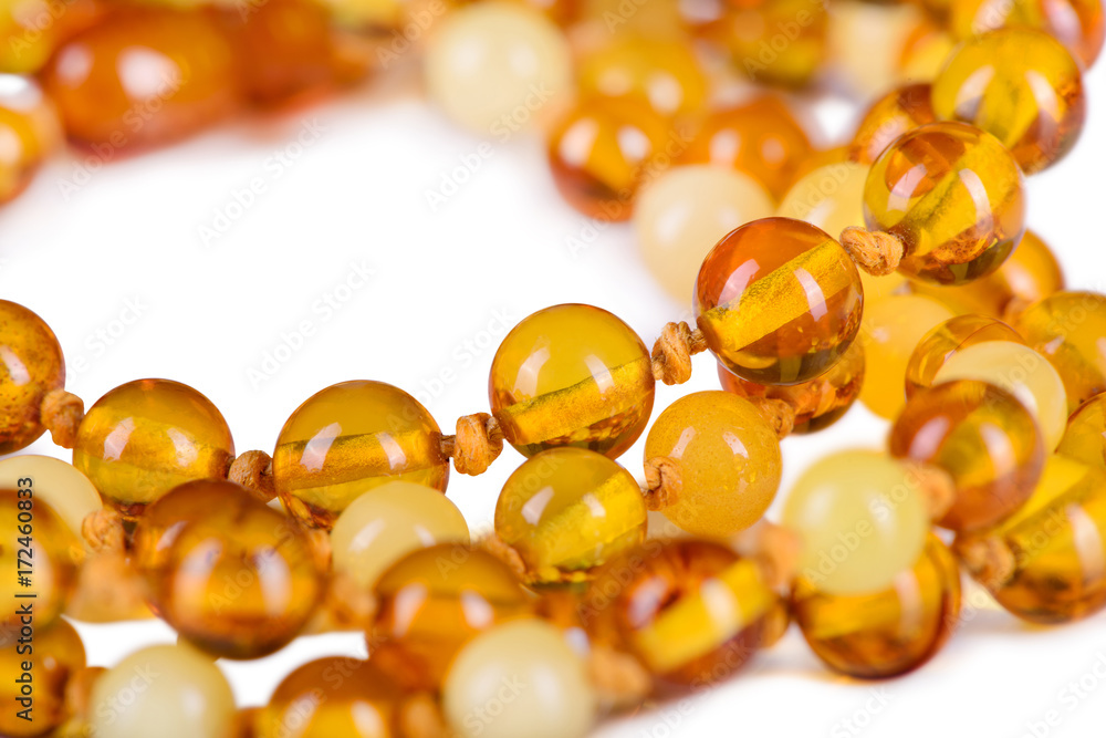 Fototapeta premium amber beads accessory isolated on white