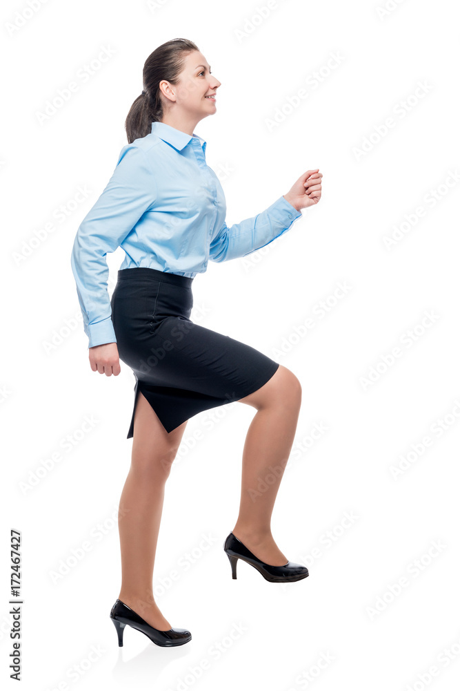 conceptual photo of a businesswoman on the career ladder isolated conceptual photo of a businesswoman on the career ladder isolated