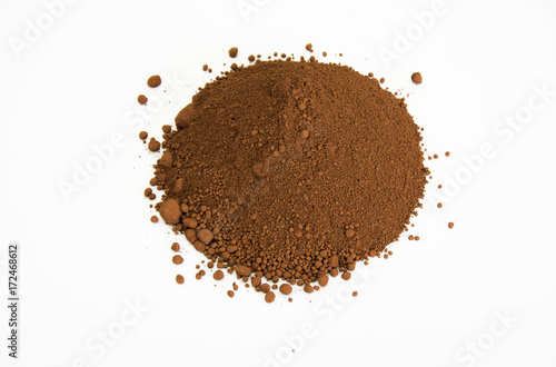 umber pigment isolated over white photo