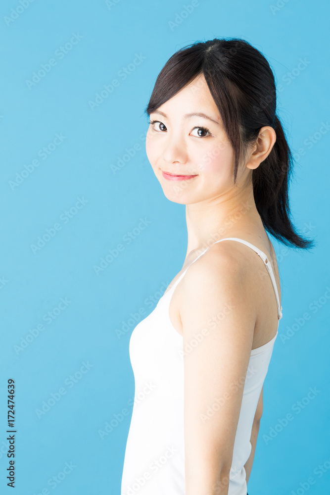 attractive asian woman beauty image isolated on blue background