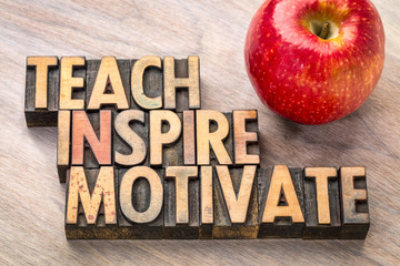 teach, inspire, motivate concept in wood type