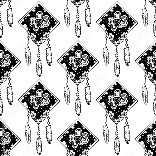 American Indian talisman with feathers, eyes over black background. Seamless pattern. Vector illustration. Ethnic design, boho chic, tribal symbol. Fabric, textile, wallpaper, paper, print clothing.