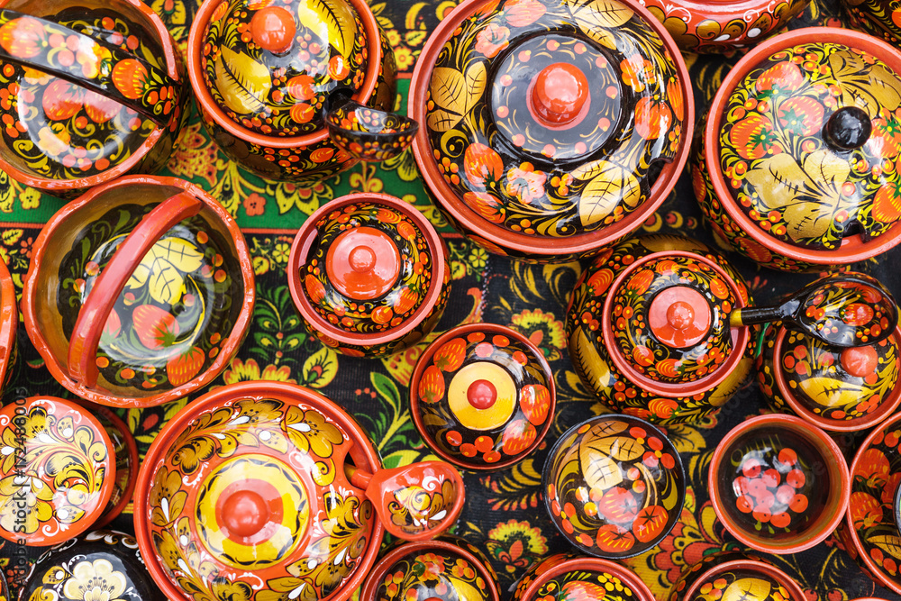 Russian wooden utensils. Khokhloma or Hohloma, traditional Russian handmade souvenir Russian wooden utensils. Khokhloma or Hohloma, traditional Russian handmade souvenir