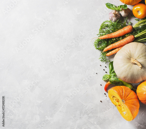 Group of vegetables over grey texture photo