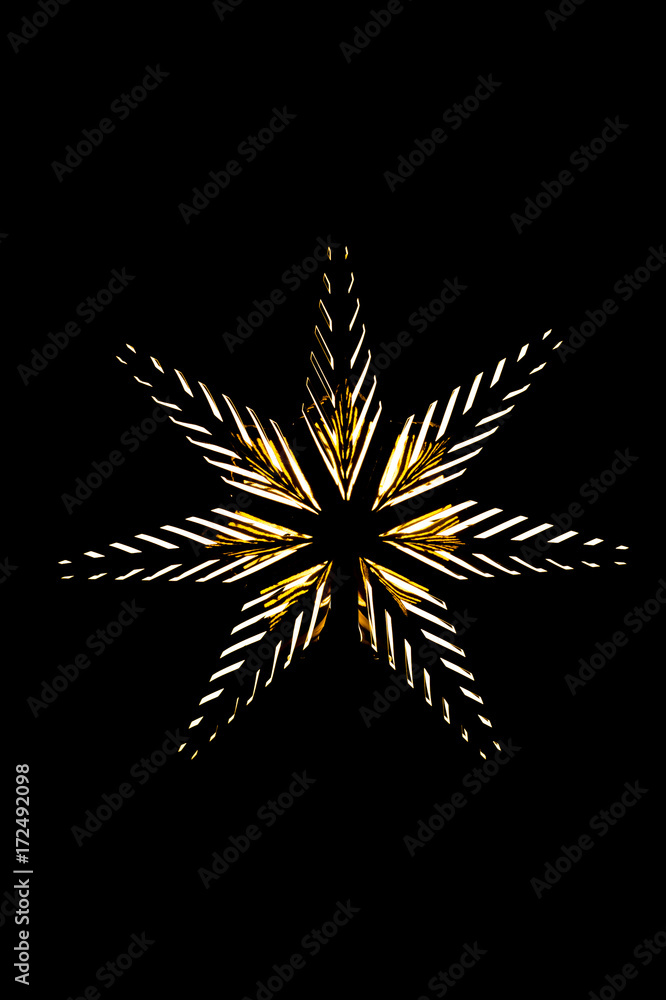Photo of a golden star with light bulbs on a black background Photo of a golden star with light bulbs on a black background