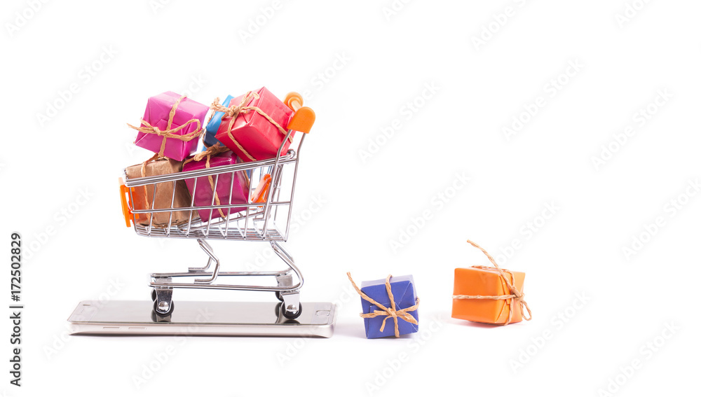 trolley and gift packages on smartphone