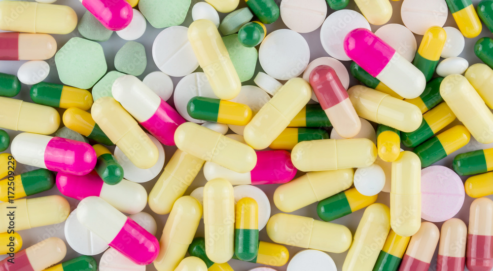 many colored drugs pills shapes texture background many colored drugs pills shapes texture background