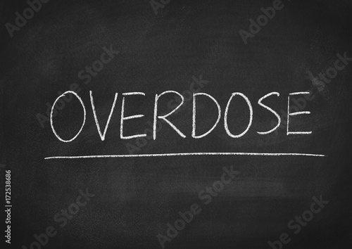 overdose concept word on a blackboard background photo
