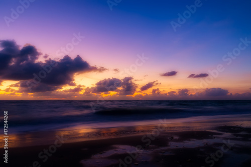 Sunrise sky on the beach. © noppharat