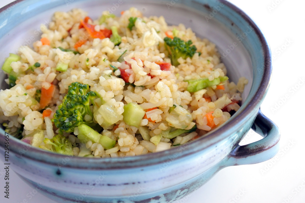 Bulgur salad served in a clay bowl Bulgur salad served in a clay bowl
