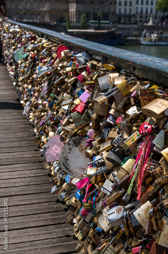 Love padlocks on Pont des Arts bridge, Seine river in Paris. 